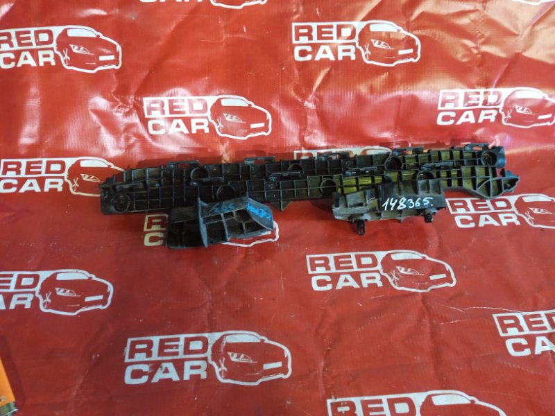 Крепление бампера Toyota Corolla Fielder NZE141-9192476 1NZ-D910011 2011 заднее (б/у)