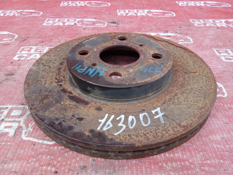 Тормозной диск Toyota Porte NNP11-0040319 1NZ-3868333 2005 передний (б/у)