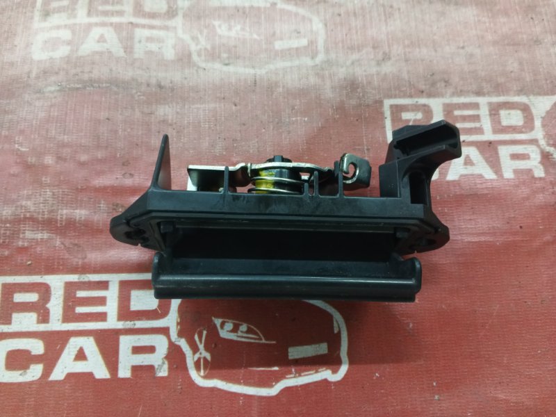 Ручка открывания багажника Toyota Sienta NCP85-5001894 1NZ-C384328 2006 задняя (б/у)