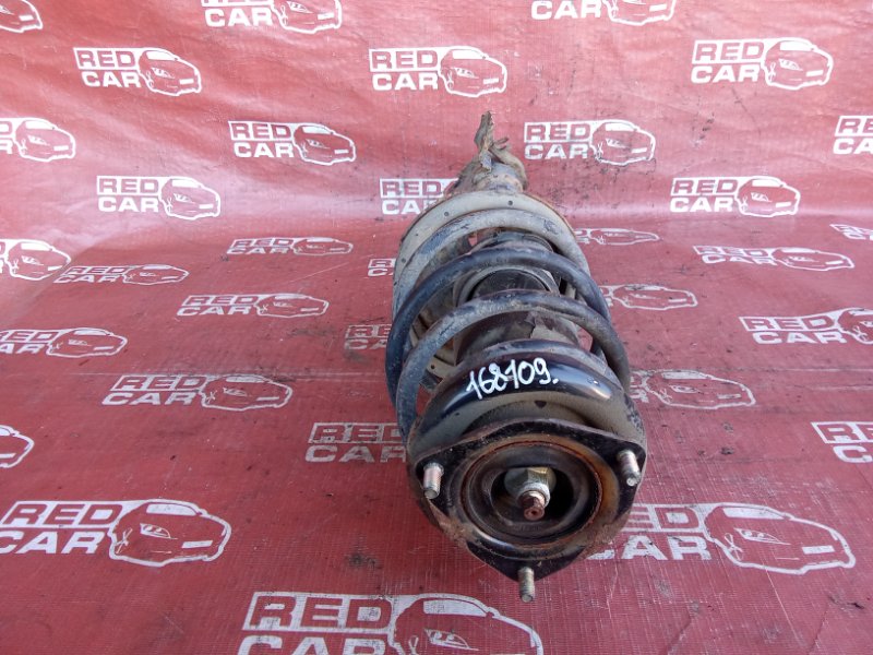 Стойка Nissan Sunny FB15-111434 QG15-412680 2000 передняя левая (б/у)