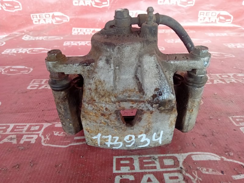 Суппорт передний левый TOYOTA RACTIS 2008 NCP105-0024969 1NZ-5366184 47750-52211 контрактная