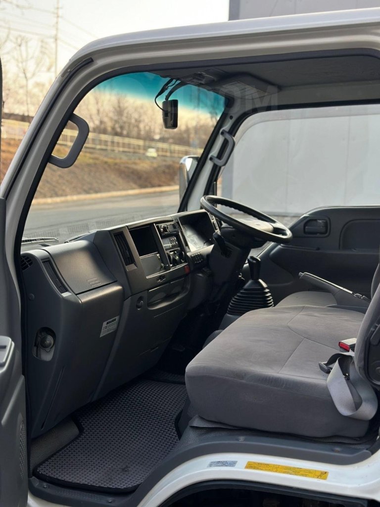 Накладка торпедо левая Elf NKR85A