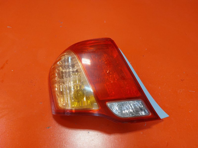 Фонарь Toyota Corolla Axio ZRE142 2ZR-FE 2006 задний левый (б/у)