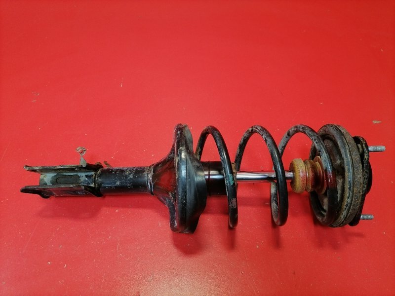 Стойка подвески Mitsubishi Lancer CS3A 4G18 2004 передняя левая (б/у)