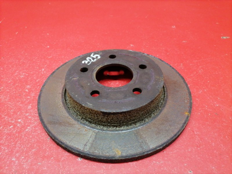 Тормозной диск Ford Focus CB4 SHDA 2010 задний (б/у) Тормозной диск Ford Focus CB4 SHDA 2010 задний (б/у)