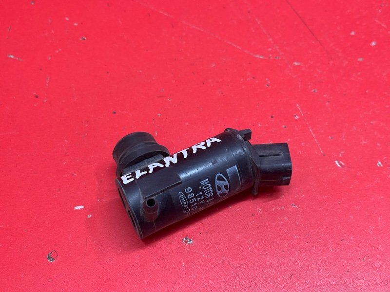 Насос омывателя Hyundai Elantra HD G4FC 2007 (б/у) Насос омывателя Hyundai Elantra HD G4FC 2007 (б/у)