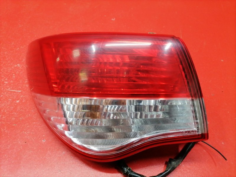 Фонарь Nissan Almera G15 K4M 2014 задний левый (б/у) Фонарь Nissan Almera G15 K4M 2014 задний левый (б/у)