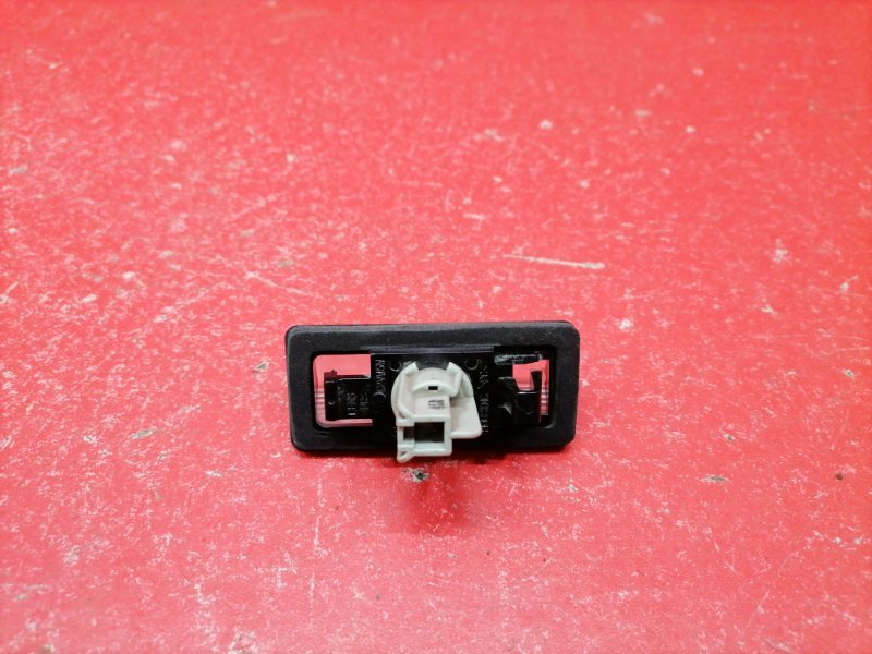 Фонарь подсветки номера Nissan Almera G15 K4M 2014 (б/у) Фонарь подсветки номера Nissan Almera G15 K4M 2014 (б/у)
