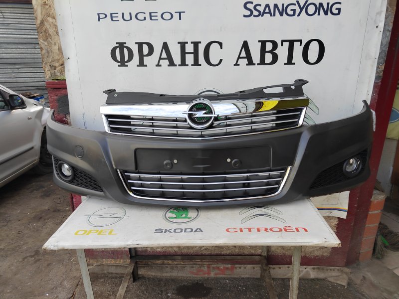 Бампер в сборе с птф Opel Astra H 07