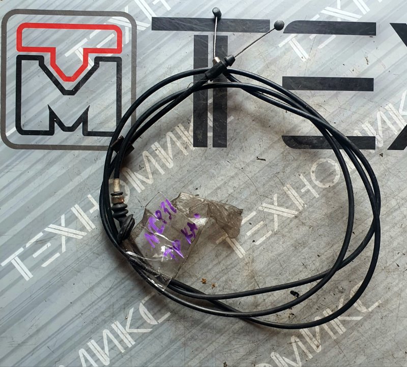 Тросик замка капота Toyota Bb NCP31 1NZ-FE (б/у)