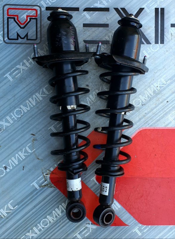 Стойка TOYOTA COROLLA AXIO NZE141 задняя (б/у)