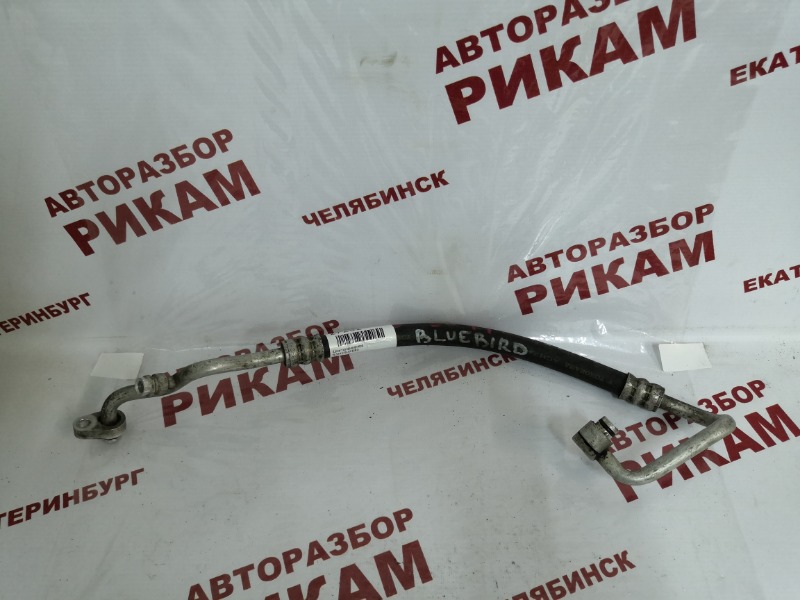 Трубка компрессора кондиционера Nissan Bluebird