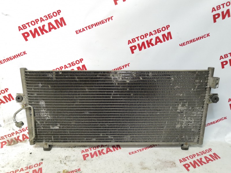 Радиатор кондиционера Nissan Bluebird EU14