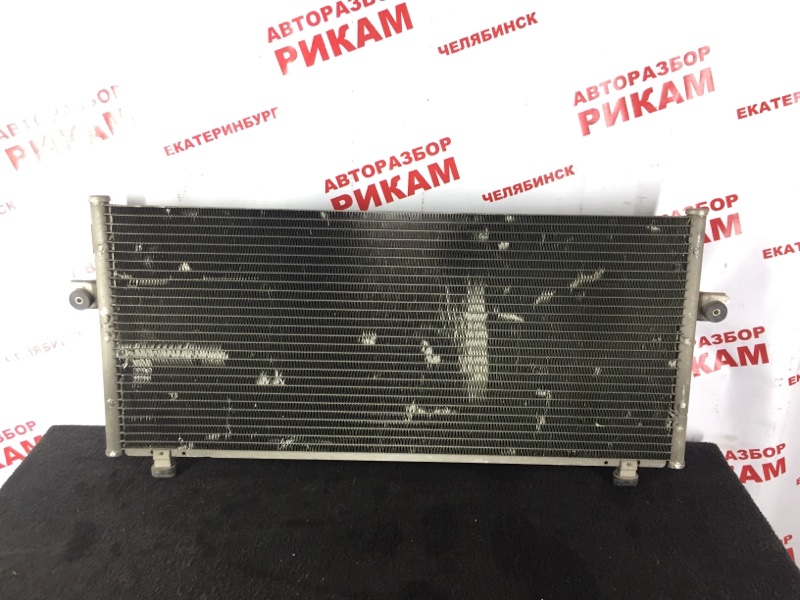 Радиатор кондиционера Nissan Bluebird EU14