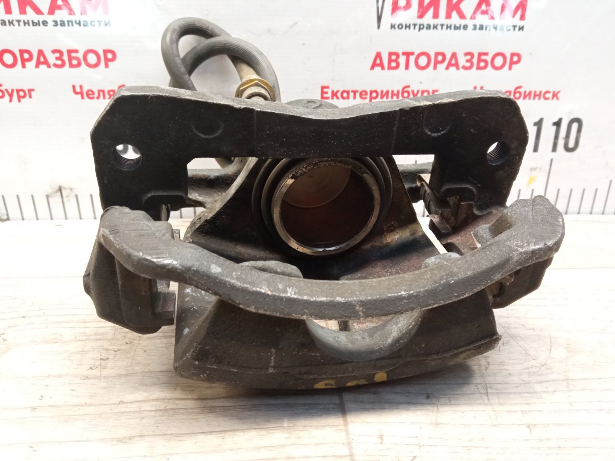 Суппорт тормозной передний левый CAMRY 1995 SXV10 5S-FE