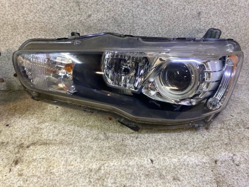 Фара Lancer 10 2007