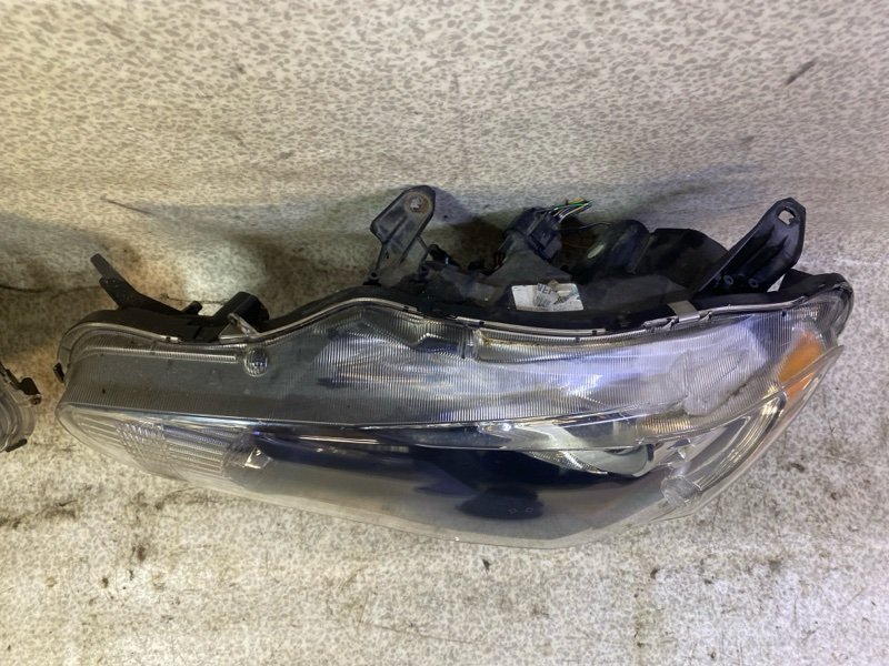 Фара Mitsubishi Lancer 10