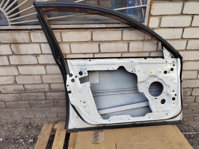 Дверь передняя левая Primera 2004 WTP12