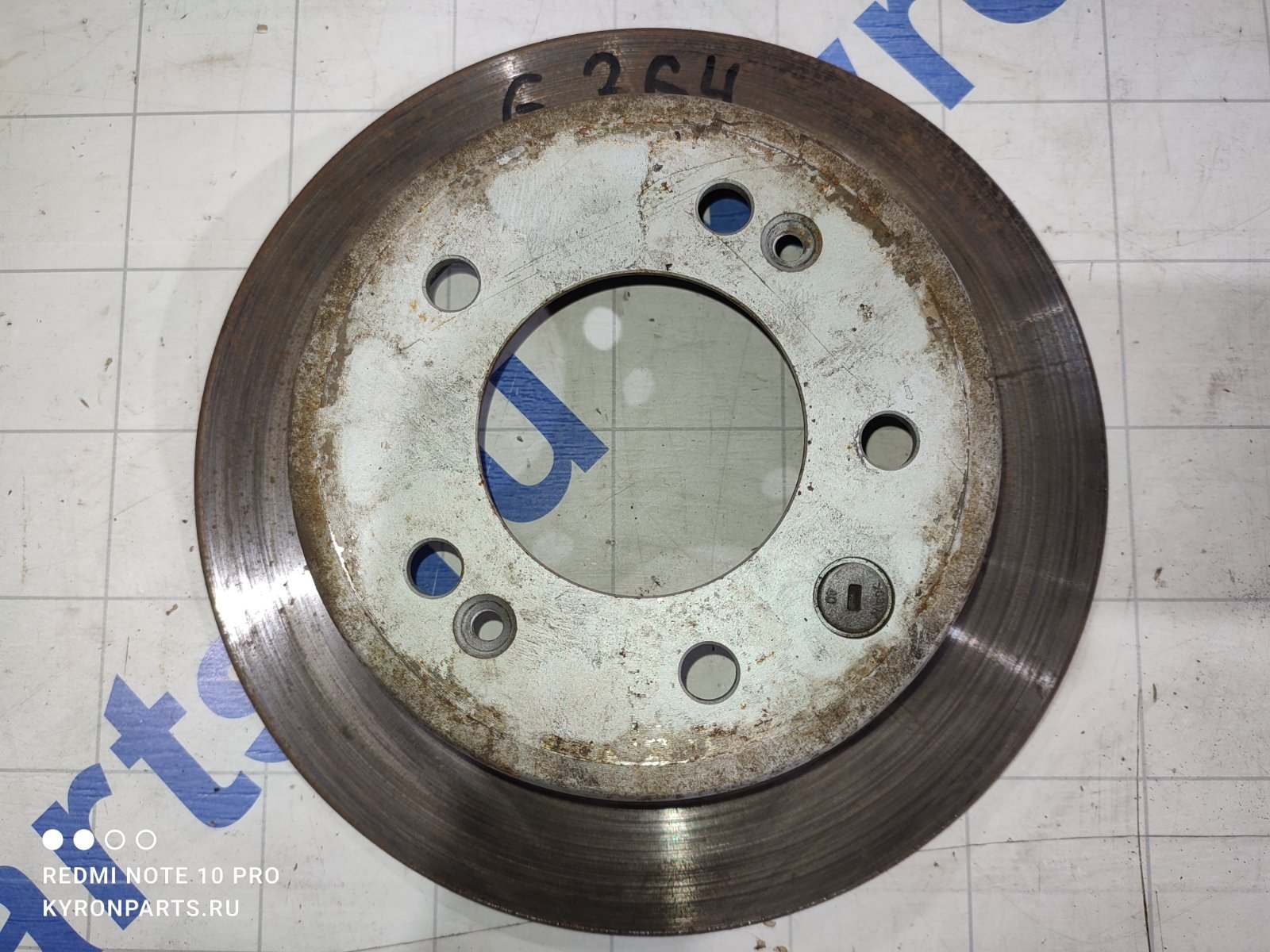 Диск тормозной задний Hyundai IX35 2014 LM U2/D4FD 584111H100 Б/У