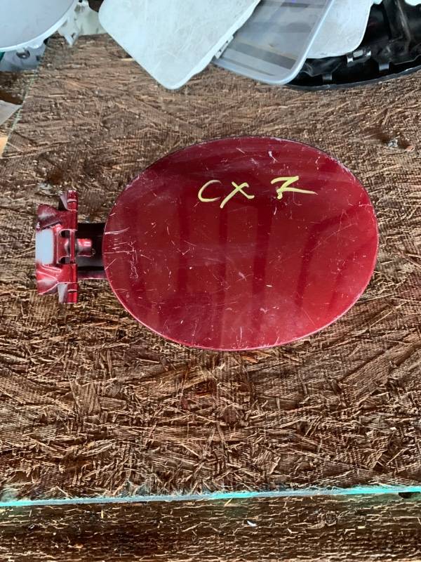 Запчасть лючок бензобака Mazda СХ-7 контрактная Лючок бензобака Mazda СХ-7 контрактная