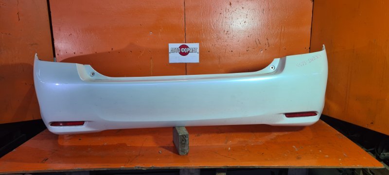 Бампер TOYOTA corolla axio NKE165 1NZ-FXE 2013 задний (б/у)