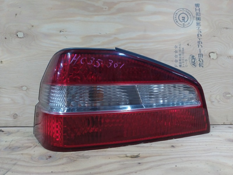 Фонарь стоп-сигнала Nissan Laurel HC35 RB20DE 2001 левый (б/у)