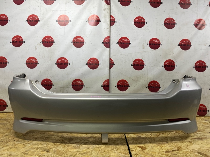 Бампер Toyota Wish ZNE14G 1ZZ-FE 2006 задний (б/у)