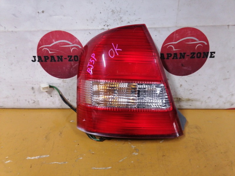 Фонарь стоп-сигнала Mazda Familia BJ5P ZL-DE 1999 левый (б/у)