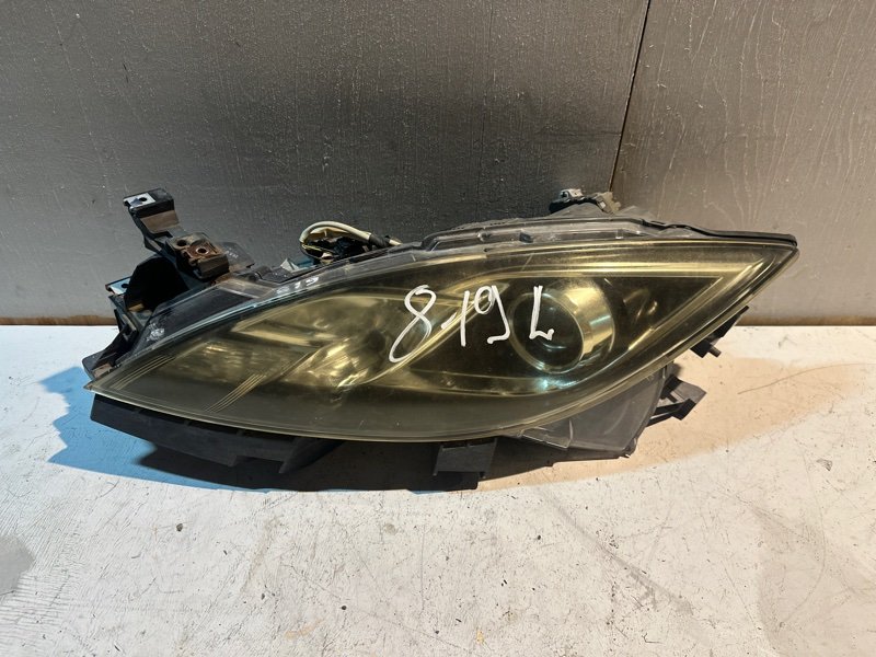 Фара Mazda atenza GH5FW L5VE 2009 передняя левая (б/у) Фара Mazda atenza GH5FW L5VE 2009 передняя левая (б/у)
