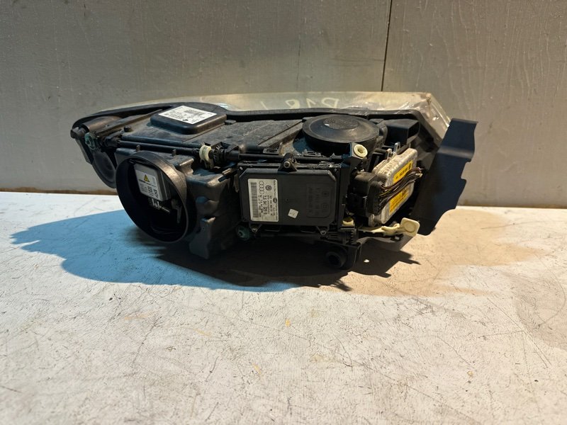 Фара volkswagen TOUAREG 7L7 BHK 2008 передняя левая (б/у) Фара volkswagen TOUAREG 7L7 BHK 2008 передняя левая (б/у)