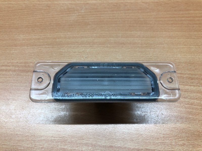 Фонарь подсветки номерного знака Nissan Almera N16 Седан
