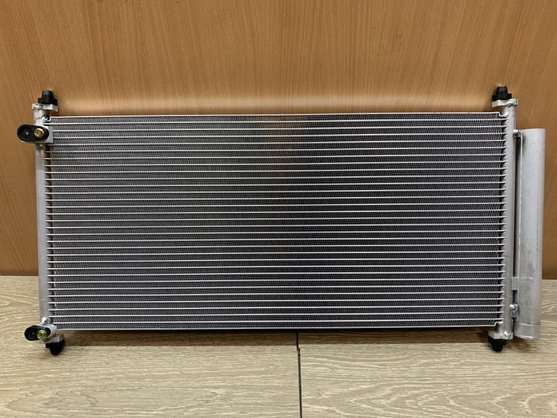 Радиатор кондиционера Toyota Corolla E150 1040036 новая