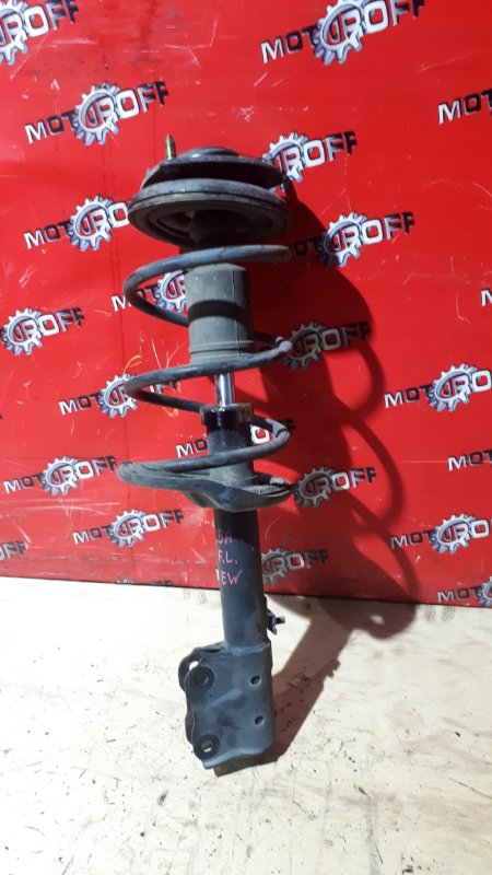 Стойка подвески Mitsubishi Colt Z25A 4G19 2002 передняя левая (б/у)