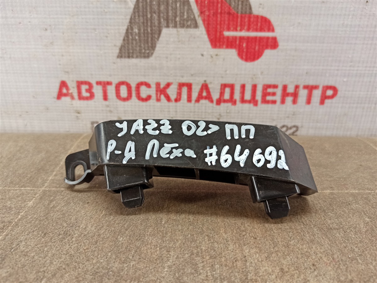 Кронштейн бампера переднего боковой Honda Jazz/Fit (2001-2009) правый