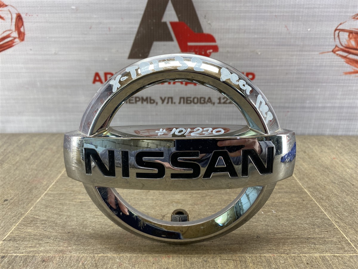 Эмблема (значок) Nissan X-Trail (2014-Н.в.) передняя