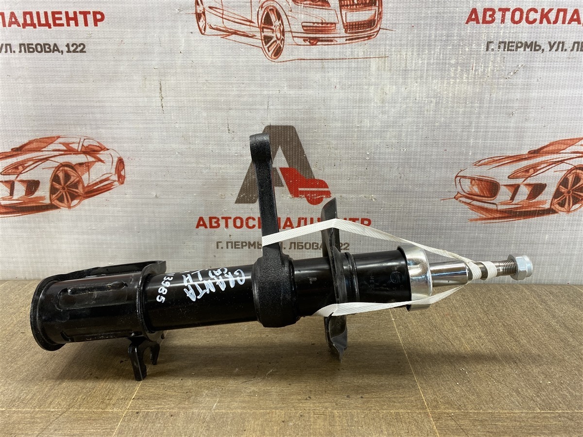 Амортизатор (амортизационная стойка) подвески LADA GRANTA передний левый (б/у)
