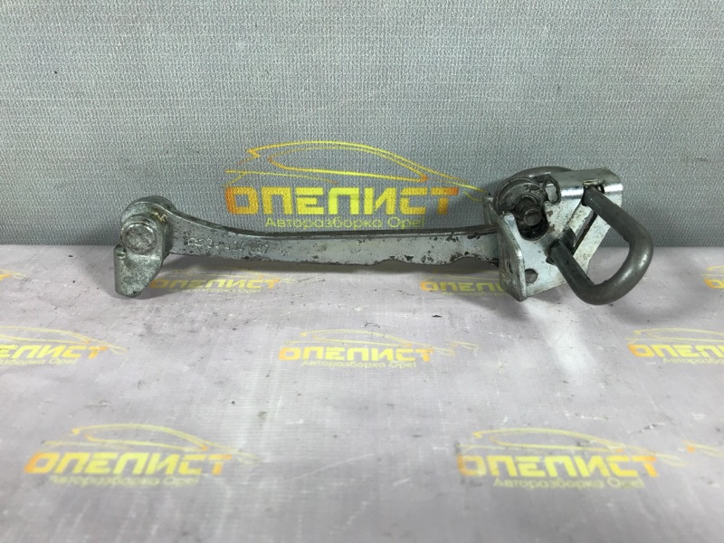 Запчасть ограничитель двери передний Opel Zafira A 24434087 Б/У Ограничитель двери передний Opel Zafira A 24434087 Б/У