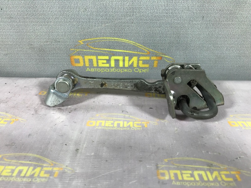 Запчасть ограничитель двери задний Opel Zafira A 24430408 Б/У Ограничитель двери задний Opel Zafira A 24430408 Б/У