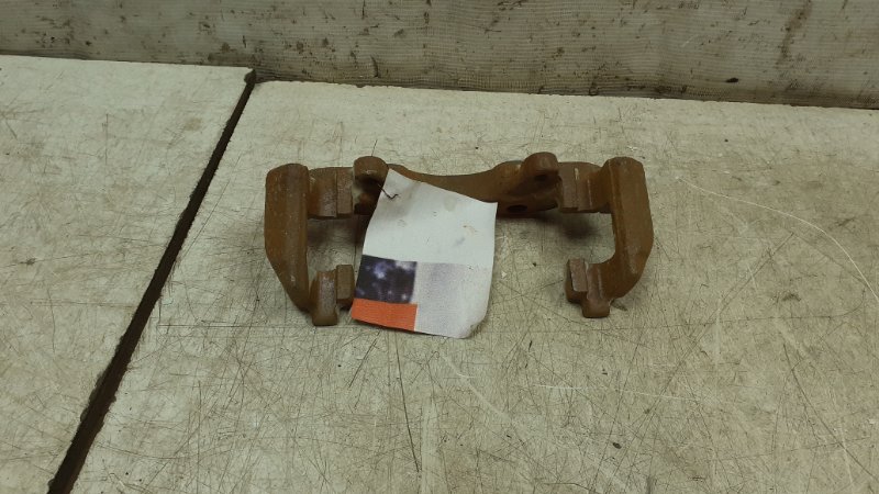 Скоба суппорта переднего