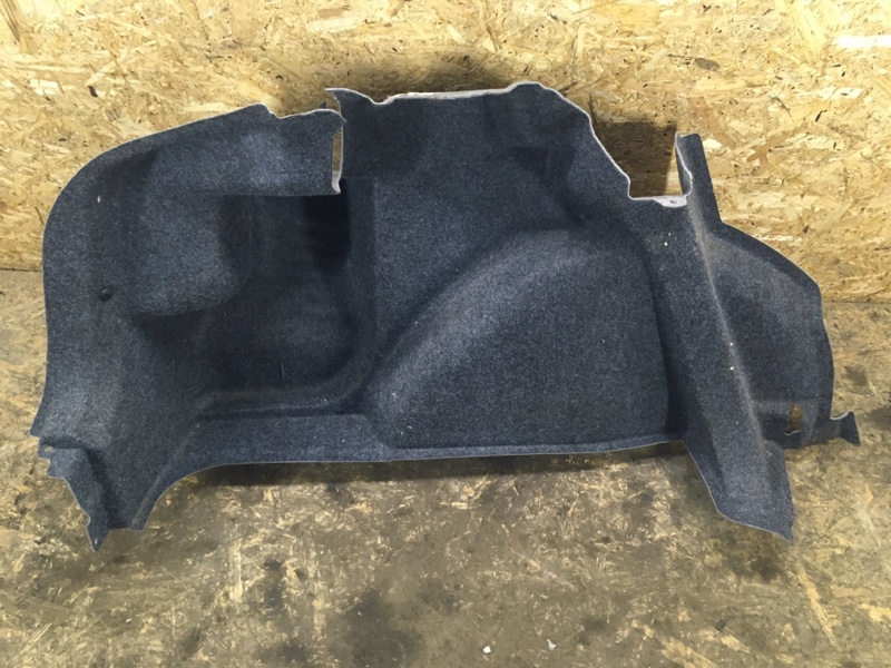 Обшивка багажника левая Polo