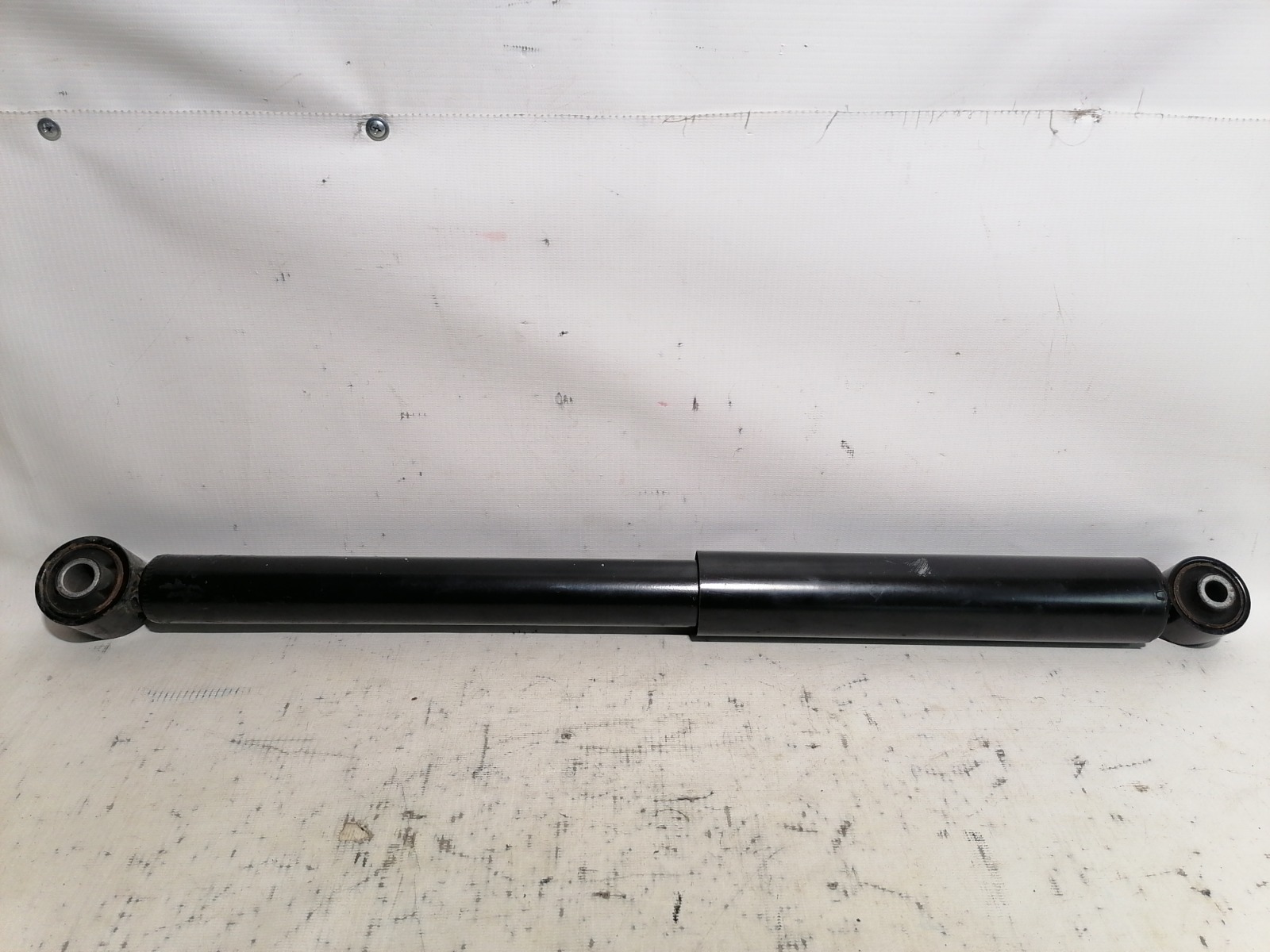 Амортизатор Nissan Pathfinder R50 VQ35DE 2002 задний (б/у)