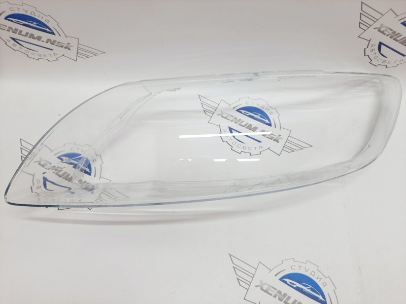 Стекло фары левое Audi Q7 4L 4L0941004A новая