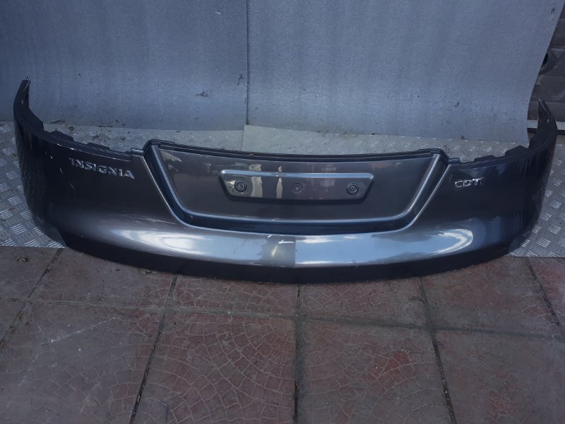 Запчасть накладка двери багажника задняя Opel Insignia 2011 A караван контрактная Накладка двери багажника задняя Opel Insignia 2011 A караван контрактная