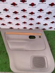 Обшивка дверей задняя левая Mazda Demio 2001