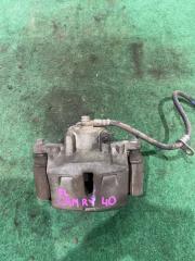 Суппорт тормозной передний левый Toyota Camry 2011