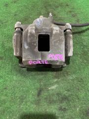 Суппорт тормозной передний левый Toyota porte 2005