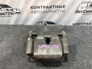 Суппорт тормозной передний левый Toyota Vitz 2006