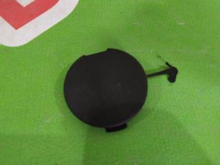 Запчасть заглушка буксировочного крюка передняя Mitsubishi Lancer 2010-