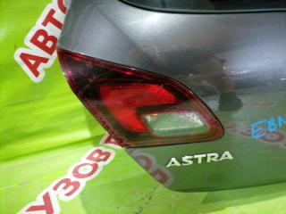 Фото запчасти фонарь задний левый внутренний Opel Astra 2010-2017 контрактная запчасть Запчасть фонарь задний левый внутренний Opel Astra 2010-2017