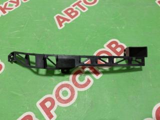 Запчасть кронштейн фары правый Mazda 3 2003-2009